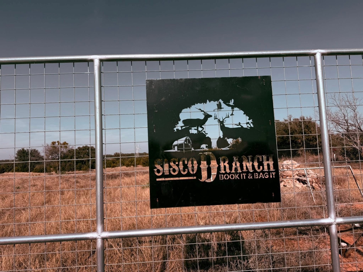 Texas' Top Hunting Outfitter - The Sisco D Guarantee Sisco D Ranch front entrance gate in Goldthwaite, Texas